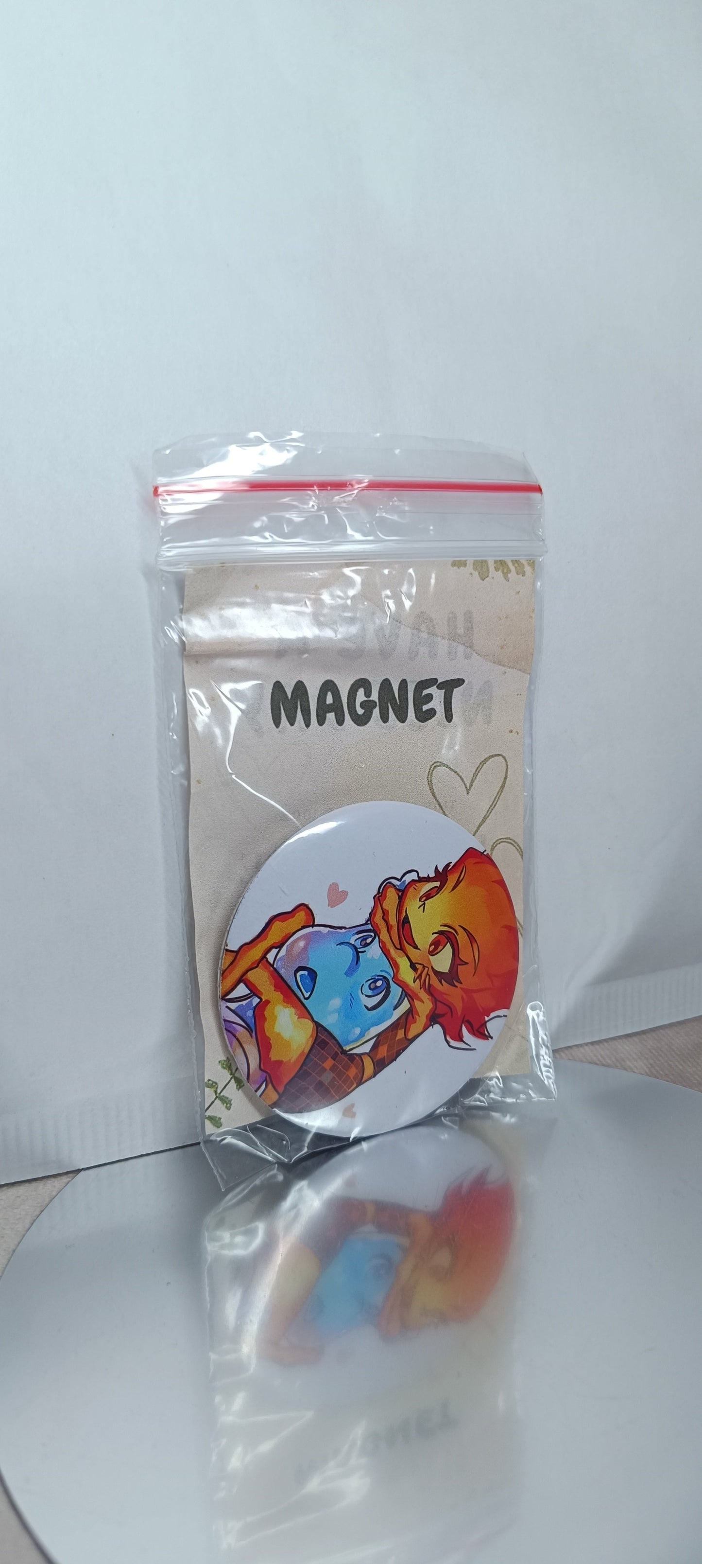 Magnes Między nami żywiołami 58 mm | Fan-made pin | OUTLET